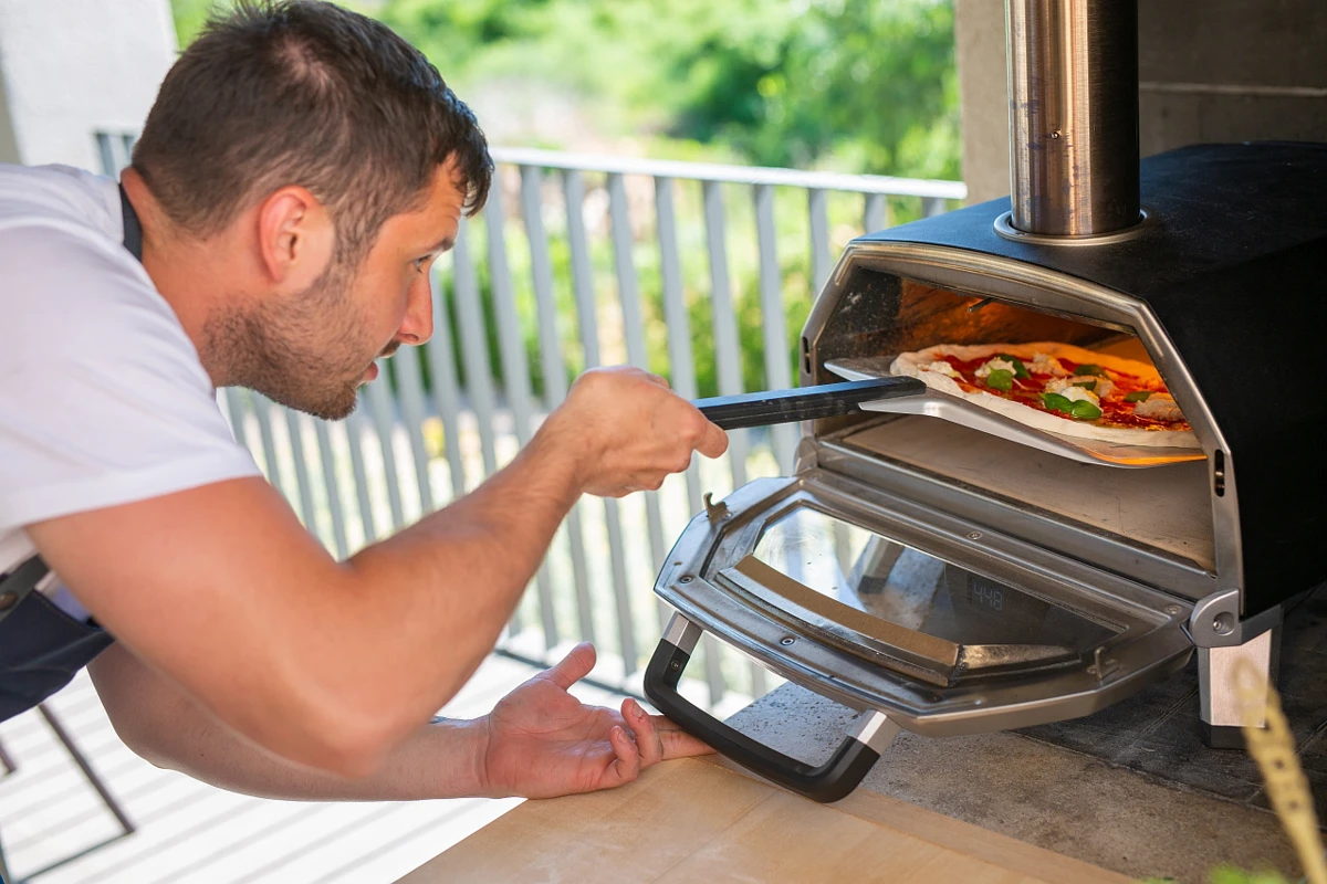 Pizza goes in oven